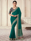 Green organza saree features art silk blouse